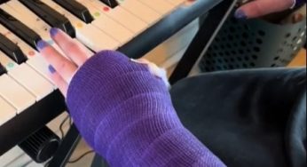 Queen of cast with perfect nails play the piano